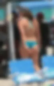 Bunch of sexy babes at the beach in bikinis