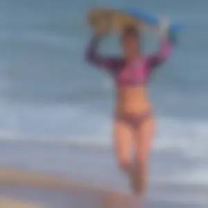 Candid girls surfing on the beach