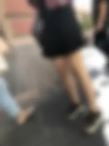 Very nice legs of a candid girl wearing a skirt