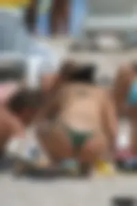 Beach voyeur girls in bikinis, thongs and topless
