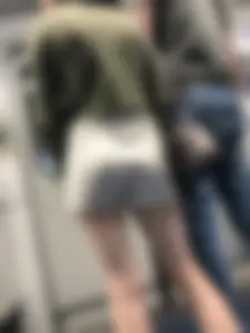 Subway train and subway station creepshots of a candid girl wearing shorts with pale skinny legs