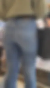 Girl wearing tight blue jeans at the store, closeups of her hot ass