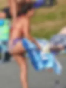 Hot ass milf with an amazing body at the pool