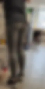 Slim clerk in tight grey jeans