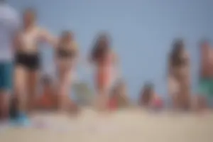 Group of sexy girls on the beach in bikinis with nice bodies