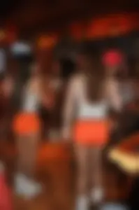 Candid sexy Hooters girls in their uniforms
