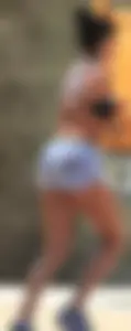 Ebony babe in Hooters shorts out for a run and walk