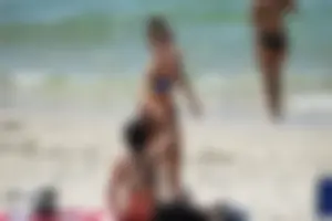 Sexy ass girl with a perfect body in her bikini on the beach