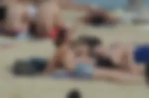 Topless girls on a beach in Barcelona