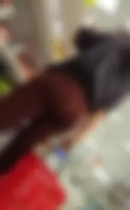 Pretty brunette in red leggings round ass
