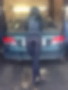 Milf in Yoga Pants Bend Over a Car - Garage Candid