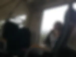 Impossible candid bespectacled cutie with giant boobs sitting in a public train creepshots