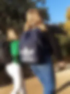 Two beautiful teens in jeans. One white and one blue jeans