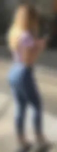 A few girls with tight asses in jeans waiting for