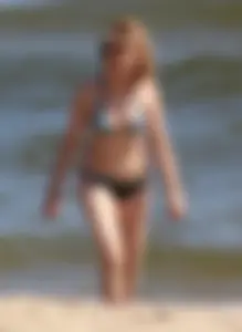 Two sexy beach teens in bikinis, one thick and one skinny with big boobs