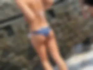 Perfect ass showering outside in water park