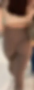 Cutie with round ass in beige leggings at the mall