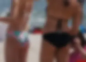 2 cute beach girls in bikinis