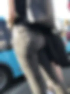 Amazing candid ass in tight grey jeans street closeups on a crosswalk