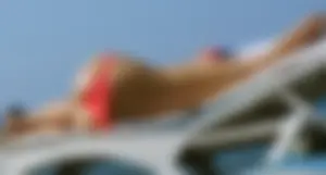 Girl with Awesome Booty on Sunbed at the Beach Candid Photo