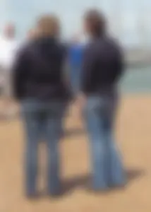 Street candid booties in tight blue jeans