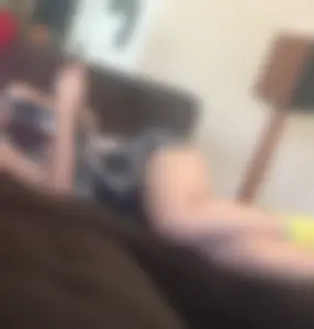 Girl in a Cozy Shirt And Yellow Socks With Awesome Sexy Legs With a Tattoo on Her Thigh Lying on the Couch Home Creepshot