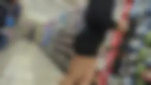 Blonde girl in black shorts