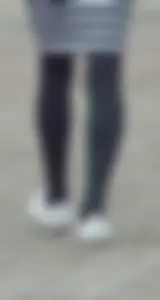 Slim legs in black pantyhose street closeups