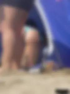 Couple of thick beach teens in little thong bikinis