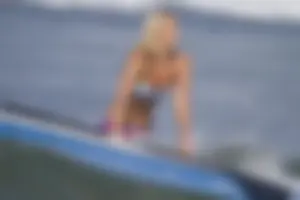 Candid surfer babes on the beach and in bikinis
