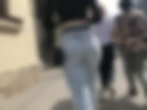 Awesome booty in ripped tight jeans street photos