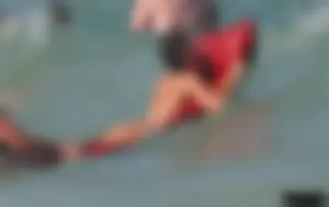 A bunch of sexy beach voyeur babes in bikinis, thongs and topless