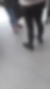 Girl wearing a black skirt over her leggings