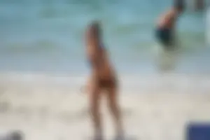 Sexy ass girl with a perfect body in her bikini on the beach