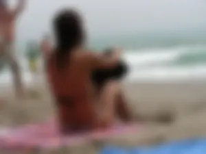 Hot topless girl on the beach in a thong bikini with a nice ass