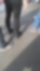 Girl wearing a black skirt over her leggings