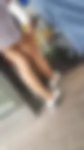 Legs in Pantyhose Street Closeups Gallery - Girl Scratching Her Leg Under Skirt