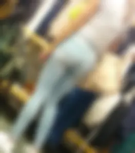 Girl shopping in light colored tight jeans with a nice ass