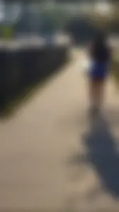 Sexy Candid Girl in a Top And Blue Shorts Walking Down the Street Creepshots Gallery