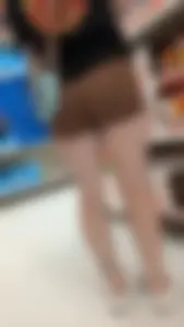 Cute petite bubble blonde hair in short brown spandex. OC