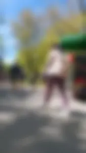 Latina with tight maroon leggings - close at end - Video