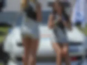 Car show models in sexy short outfits