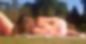 Pink bikini sexy girl laying out with a friend