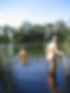 Nudist girls swimming in the river in the countryside, she's having goosebumbs