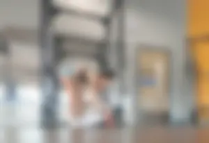 Gym brunette in tight grey shorts