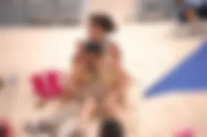 Assortment of sexy babes at the beach in bikinis