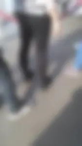 Girl wearing a black skirt over her leggings