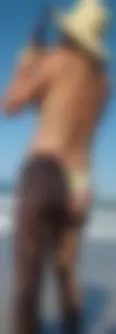 Cute girl on the beach with a decent body in thong bikini