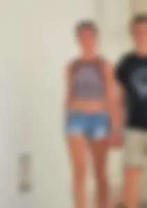 Beautiful teen out with boyfriend in short jean shorts