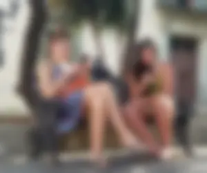 Nice legs and feet in the park (one of them showing little else)